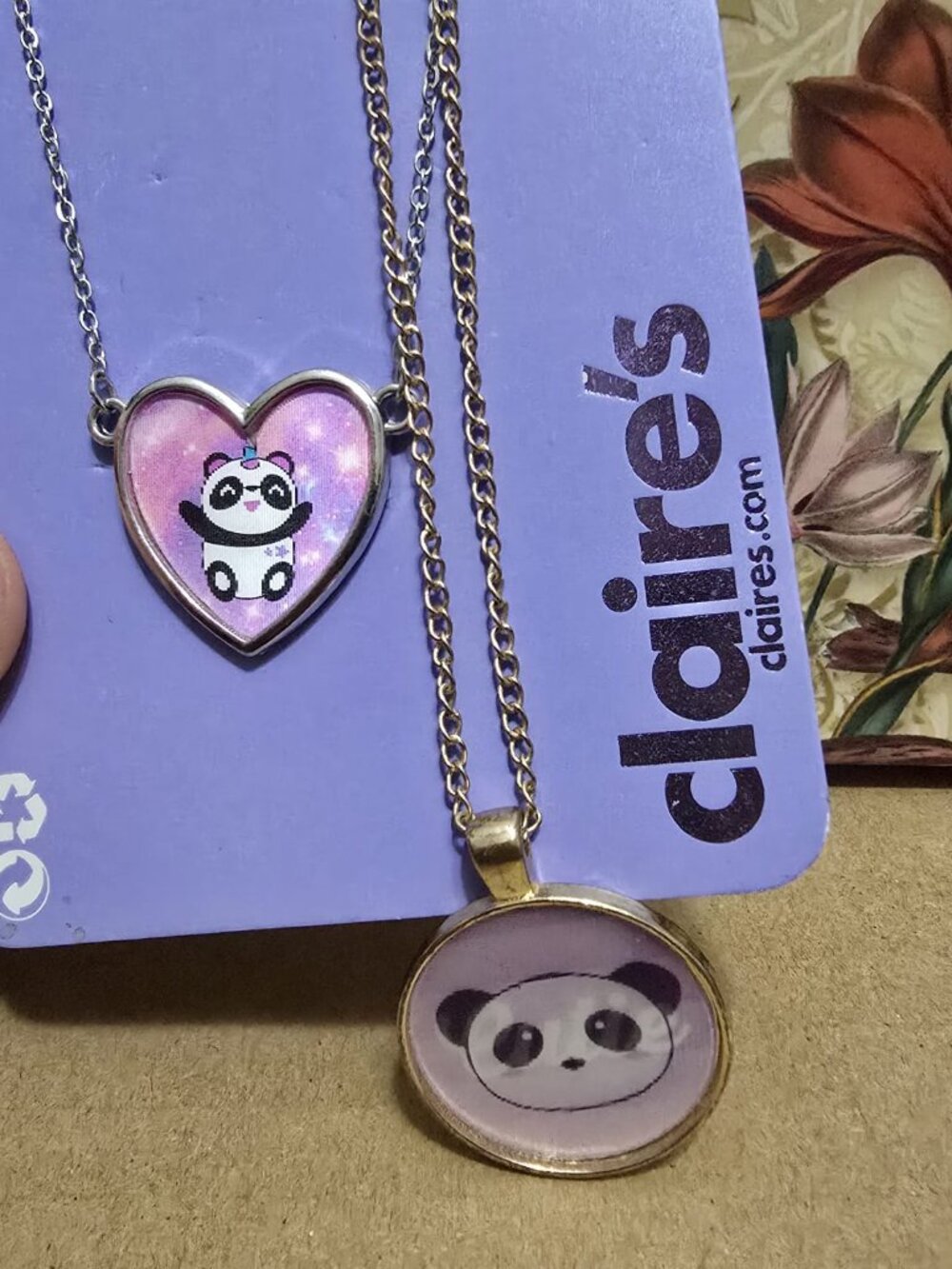 Two Claire's panda neckalces